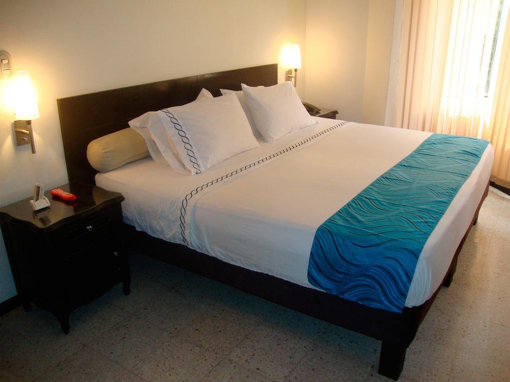 Granada Inn Hotel Cali Zimmer foto
