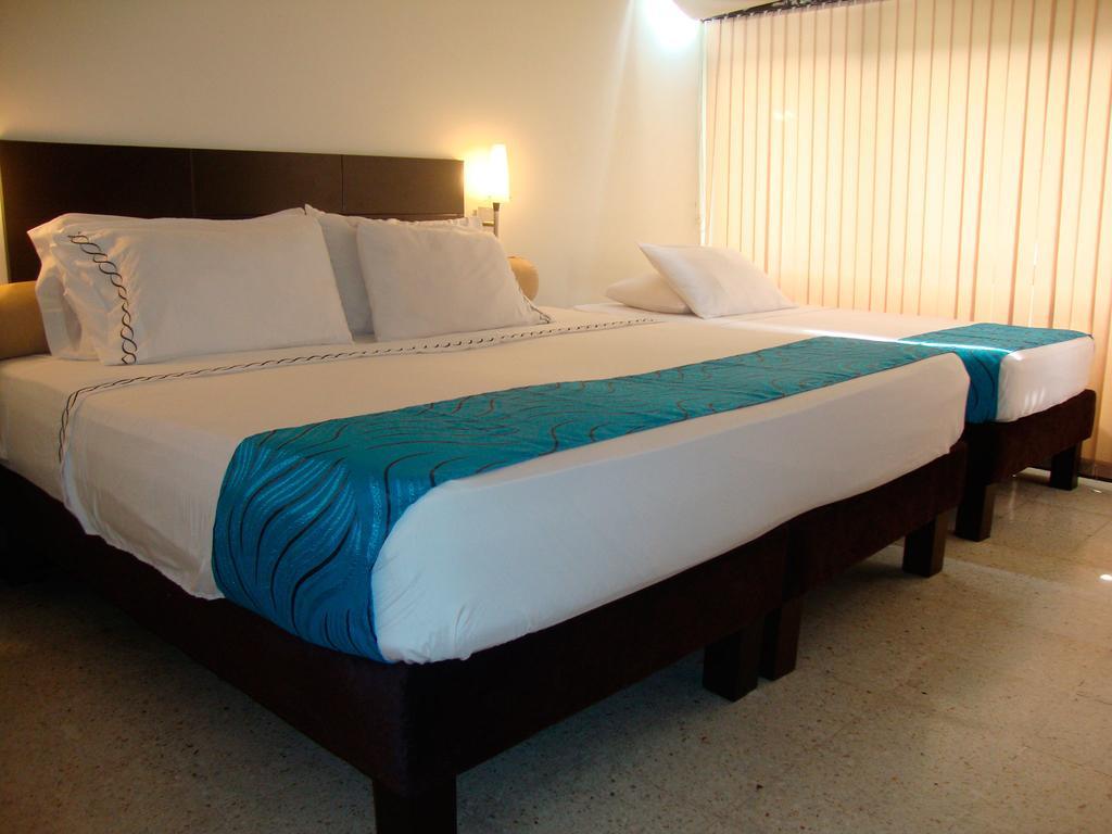 Granada Inn Hotel Cali Zimmer foto
